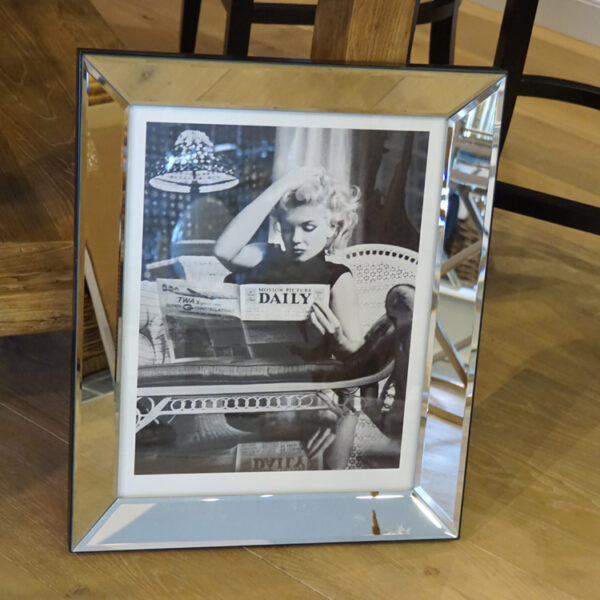 Marilyn Monroe with newspaper